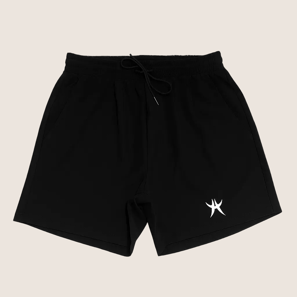 Black shorts with a white logo on a white background