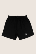 Black shorts with a white logo on a white background