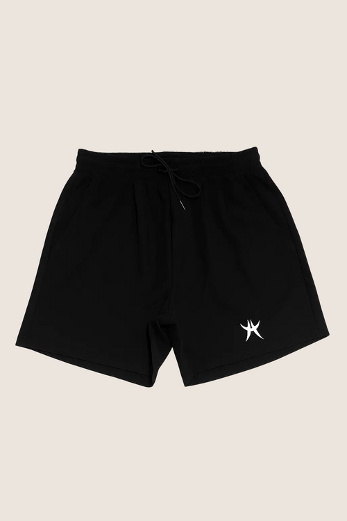 Black shorts with a white logo on a white background